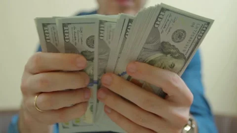Man counting dollar bills. Close up of male hands count money cash. Money c.. Stock Footage 266469373