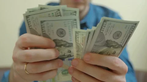 Man counting dollar bills. Close up of male hands count money cash. Money c.. Stock Footage 266469546