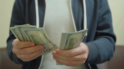 Man counting dollar bills. Close up of male hands count money cash. Money c.. Stock Footage 266469596