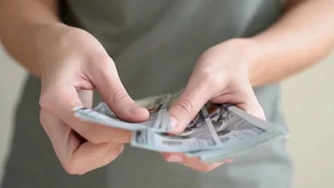 Man counting dollar bills. Close up of male hands count money cash. Money Video stock 336259994