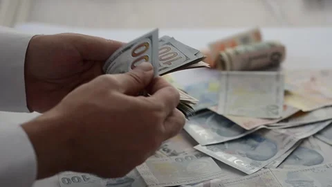 The man is counting dollar. Close up of hands. Stock Footage 133382897