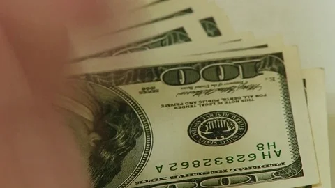 Man Counting dollars Stock Footage 70517381
