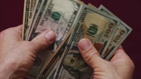 Man counting dollars Stock Footage 119144917