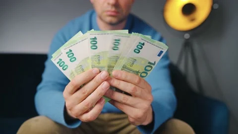 Man counting euro banknotes. Concept of investment, success, financial prospects Stock Footage 199680473