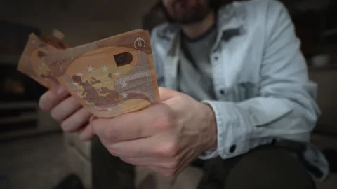 Man counting euro banknotes Stock Footage 324524154