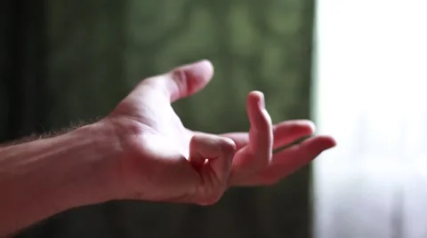 Man counting on fingers Stock Footage 65370622