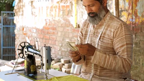 A man counting Indian currency notes - daily earnings,  self-employed, Aatman... Video stock 260802659