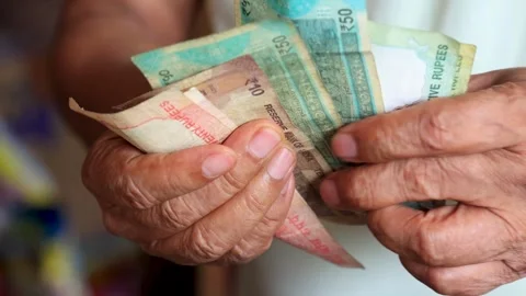 Man Counting Indian Currency Notes of Various Denominations Stock Footage 297602529