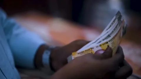 Man Counting Indian Rupee Notes with Hand Focus (Close-up) 4K Stock Footage 318200053