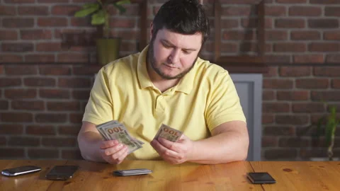 Man counting one hundred dollars bills. Businessman count money cash banknotes. 스톡 동영상 142991269