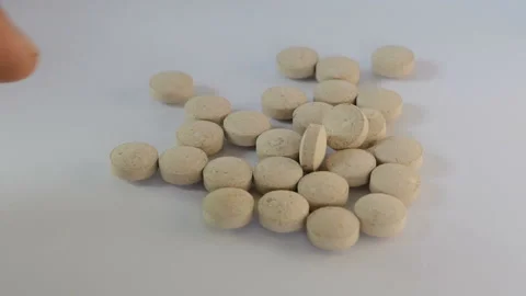 Man counting pills closeup Stock Footage 88995157