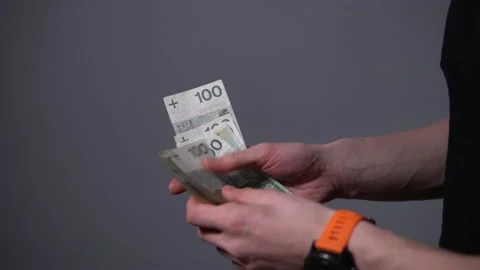 Man is counting polish money Video stock 169628622