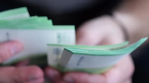 Man counting a stack of hundred Euro banknotes 10.09.2023 - Minsk, Belarus Video stock 252447496