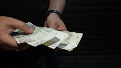 Man Counting Stack Of Polish Zloty Banknotes Close Up Stock Footage 339971658