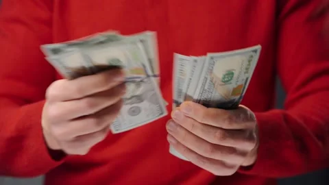 Man counting US Dollar bills, close-up Stock Footage 295292745