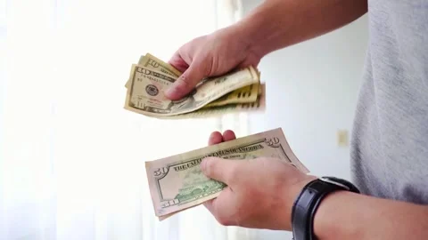 Man Counting US Dollar Bills Money, Finance, Cash, and Payment Stock Footage 320337240