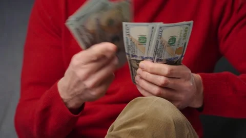 Man counting US Dollar bills, close-up Stock Footage 322939308