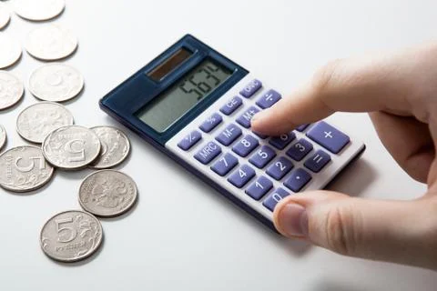 Man counts budget on a white Stock Photos