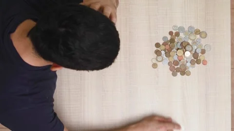 Man Counts Last Money Sitting Table at Home. Concept Poverty and Economic Crisis Stock Footage 201265178