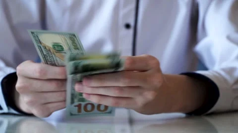 Man counts money, dollars bill Video stock 317049088
