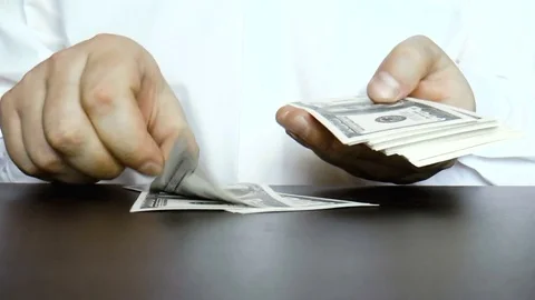 Man counts the money, dollars Stock Footage 79411164