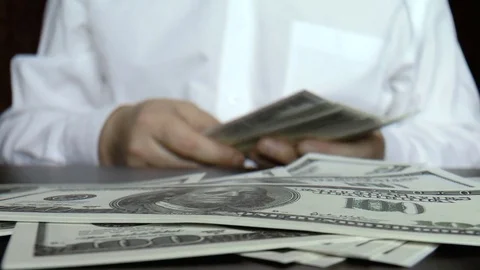 Man counts the money, dollars Stock Footage 79411333