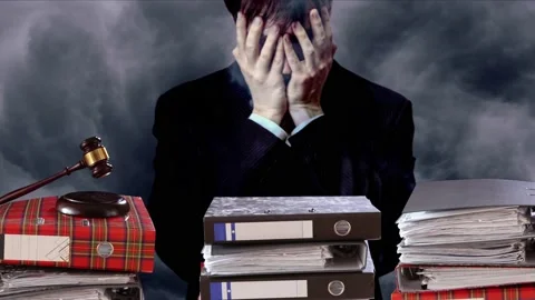 A man covered his face with his hands against a background of thunderclouds Stock Footage 236479265