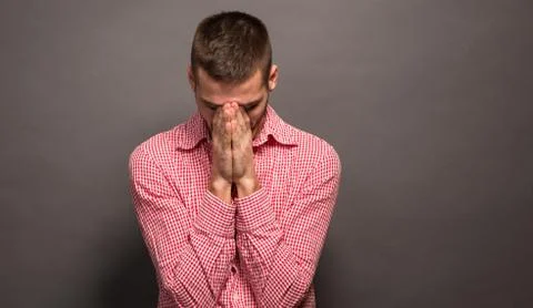Man covering eyes his face Stock Photos