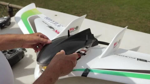 Man Covering His Model Plane With A Foam Front Stock Footage 130676655