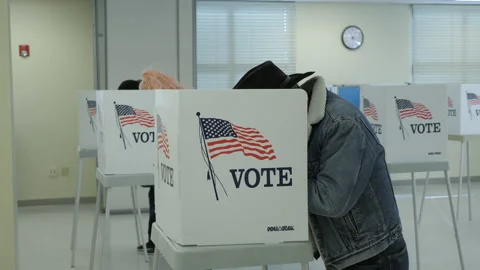 Man In Cowboy Hat Votes - Election 2020 - Vote Video stock 142010956