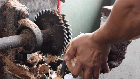 Man cracking a coconut with an automated machine Stock Footage 157469394