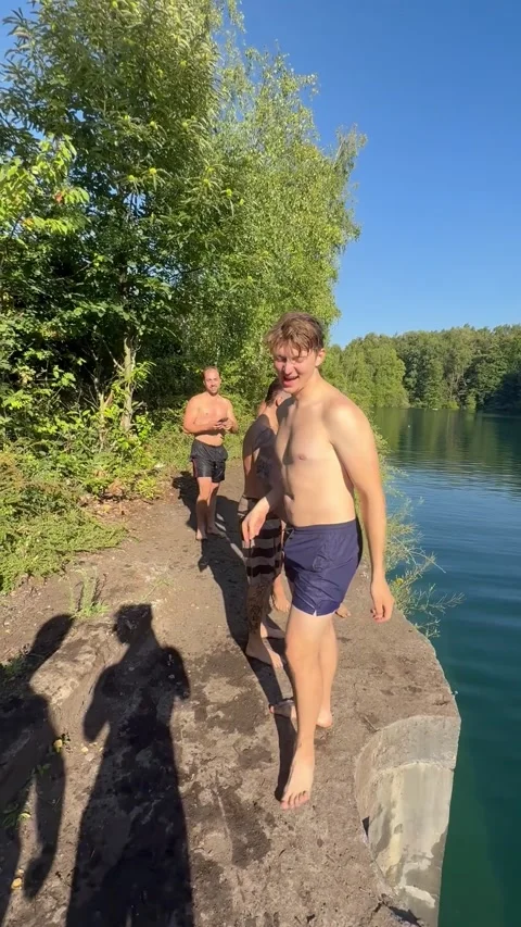 Man Cracks His Head While Getting Tossed Into Water, Belgium at Ecaussine - 22 A Stock Footage 315297290