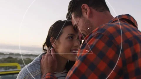 Man cradling partner, pair nuzzling at dusk, marketing ring+triangle pulsing Stock Footage 332822086