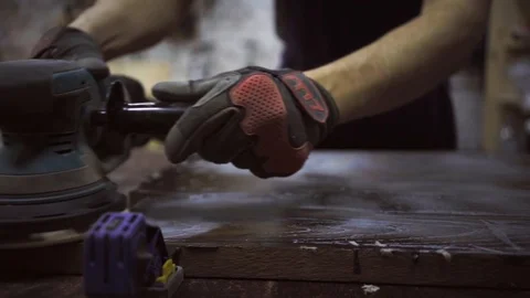Man is craft working at a work bench with power tools Stock Footage 102785246