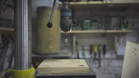 Man is craft working at a work bench with power tools Stock Footage 102857977