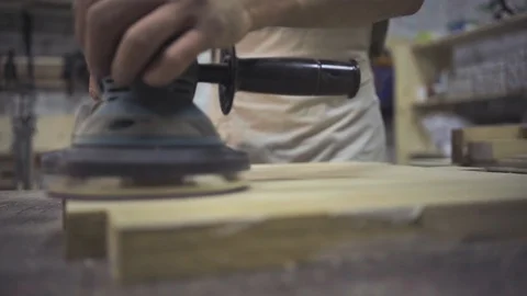 Man is craft working at a work bench with power tools Stock Footage 102902783