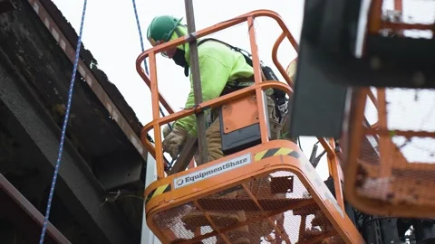 Man on Crane Lift Stock Footage 238859147