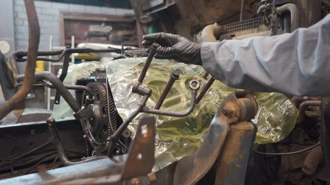 Man cranks up the engine Stock Footage 102868484