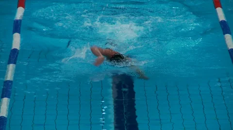 Man crawl swimming - front view Stock Footage 30459693