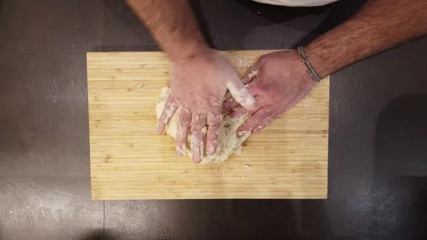 Man create a pizza dough Stock Footage 128832361