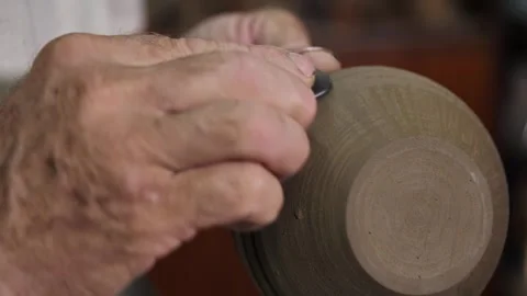 Man creates craft pottery in his own workshop using the traditional method. Stock Footage 246501916
