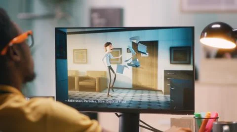Man creating 3D cartoon on computer 写真素材