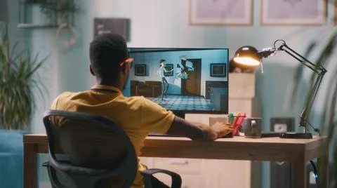 Man creating 3D cartoon on computer 스톡 사진