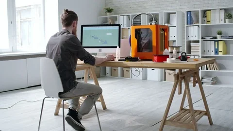 Man Creating 3D Digital Design on Computer Stock Footage 84934488