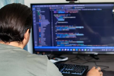 Man creating hacking software Stock Photos