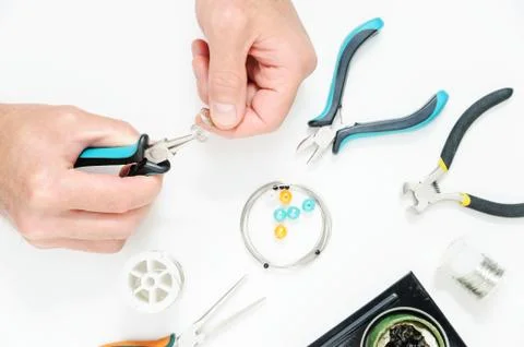 A man is  creating an ornament. Stock Photos