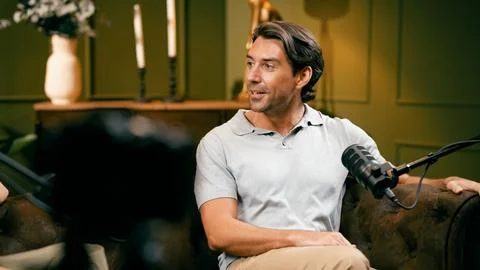 Man creating podcast content and broadcasting talk show Stock Photos