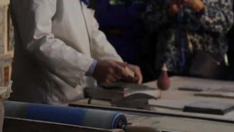 Man creating tiles for group of tourists, Portugal Stock Footage 171551430