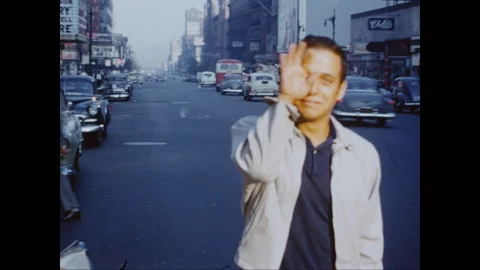 Man cries, waves goodbye 42nd street, 1950s Stock Footage 124168186