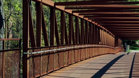 Man crossing bridge Stock Footage 75459183